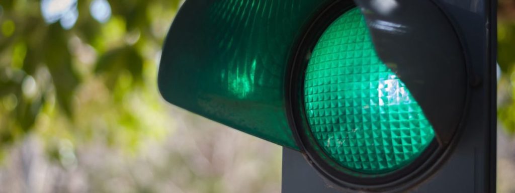 Green traffic light showing that green is a go sign